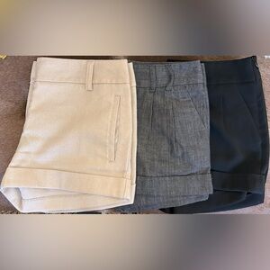 Express dressy shorts. gold, dark grey and black. 10inches in height, Size 00.